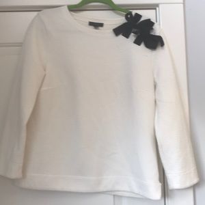 Well loved J. Crew soft holiday top with bows